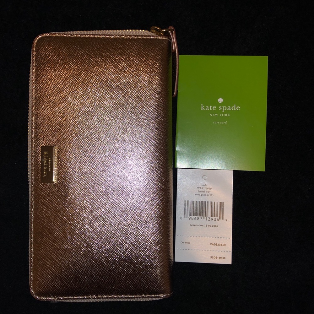 ⭐️New Kate Spade Laurel Way Rose Gold Wallet ⭐️